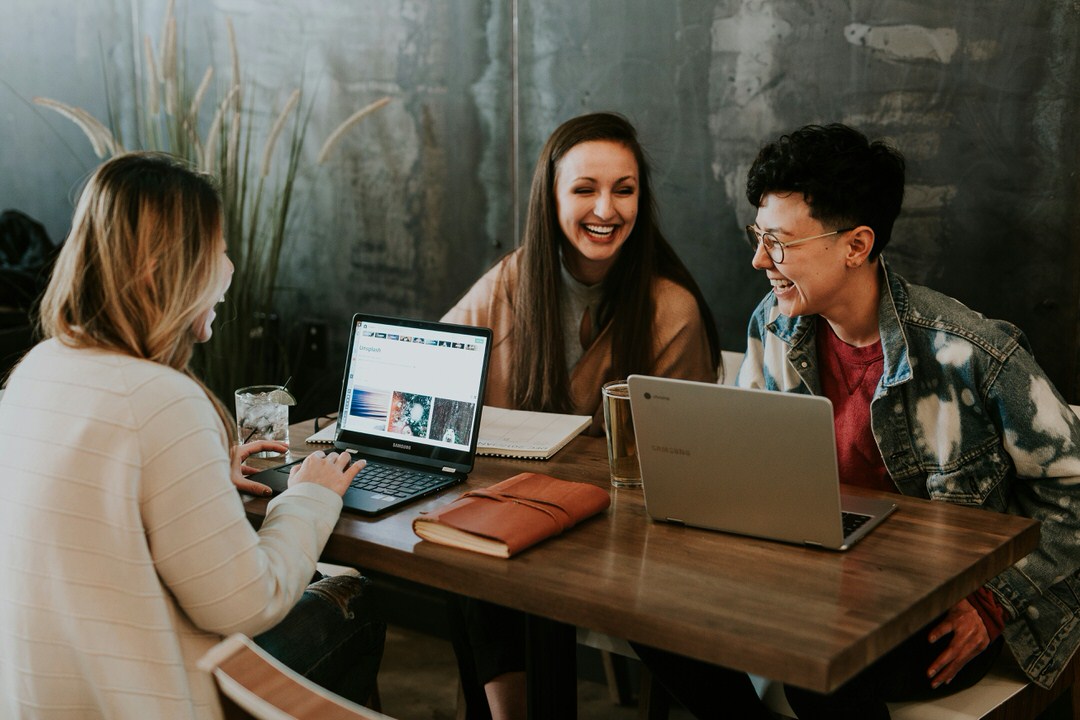 a group of college study partners helping each other thrive in college