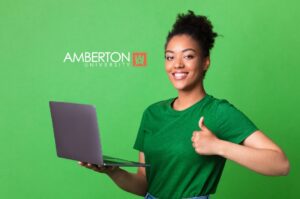 adult student giving a thumbs up after mastering her final exam