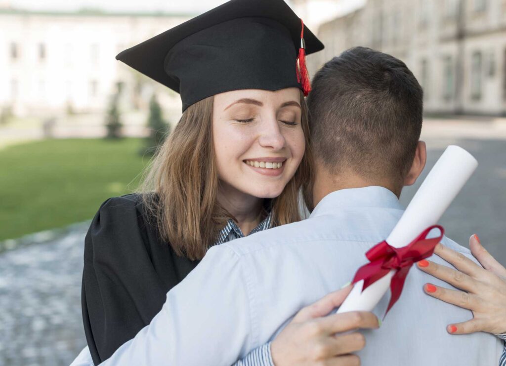 couple celebrating graduation